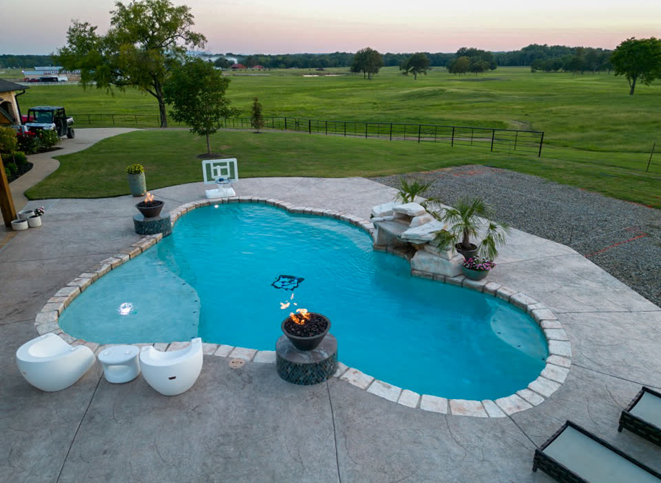 Custom backyard pool with pavilion in Muldrow, Oklahoma