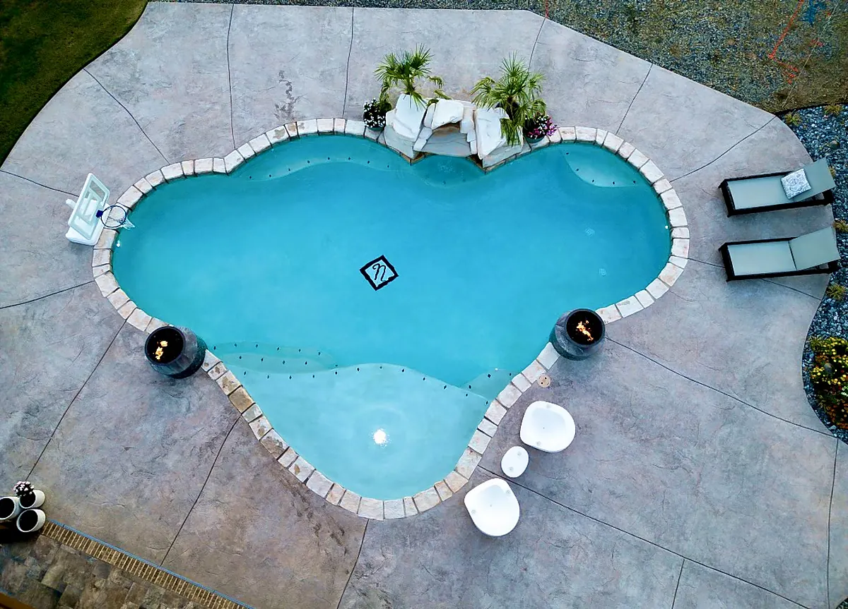 A finished custom gunite pool built by Cool Pools in Fort Smith, Arkansas, seen from above